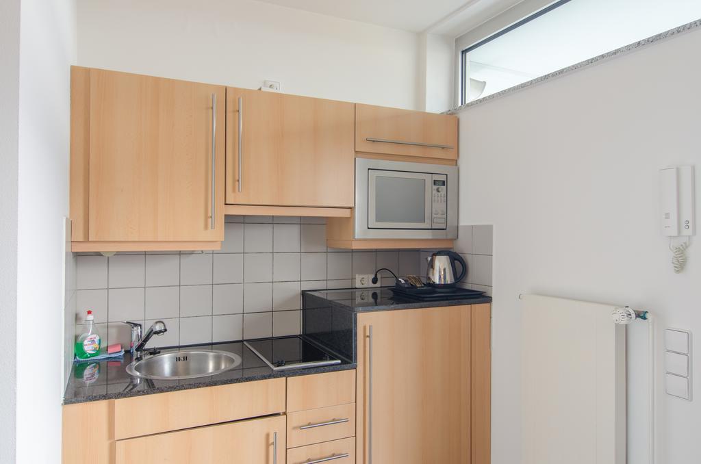 Essen City Suites Habitación foto