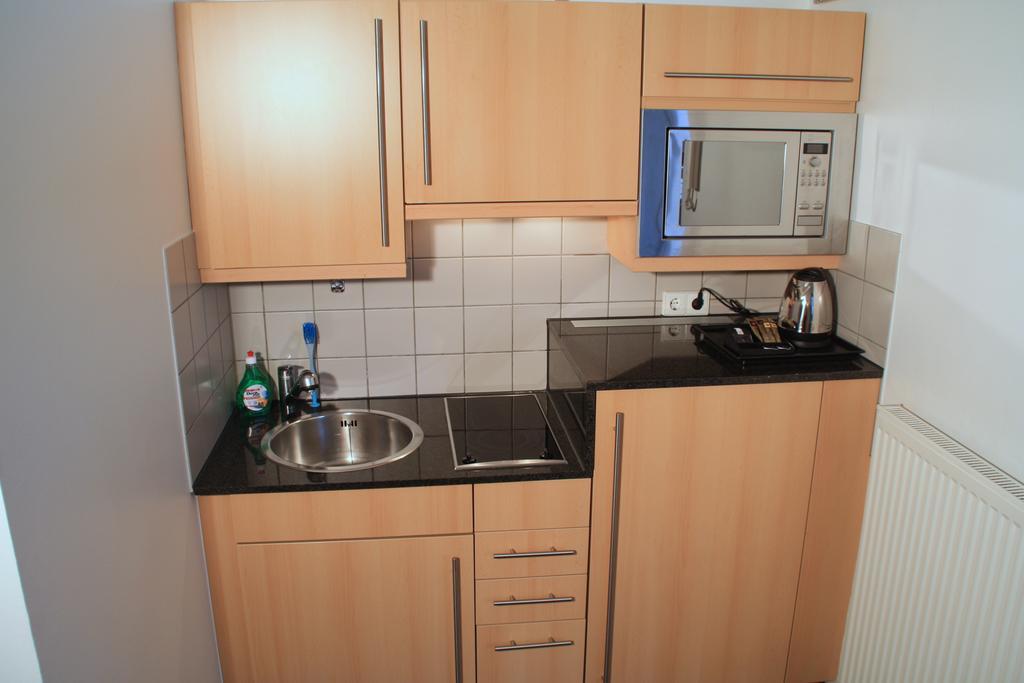 Essen City Suites Habitación foto